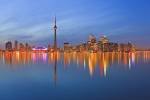 Photo of Toronto City Skyline seen at dusk from Centre Island, Toronto Islands, Lake Ontario, Ontario, Canada.