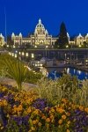 A beautiful city both by day and night, the inner harbour of Victoria, the Capital City of British Columbia, is punctuated by the illuminated Parliament Buildings as a backdrop. Seasonal flowers also adorn the waterfront.