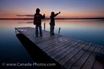 Photo: Young Boys Wharf Fishing At Sunset Lake Audy Manitoba