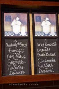 A blackboard displays the menu at a cafe along the Rue Saint-Paul in Old Montreal in Montreal, Quebec, Canada.