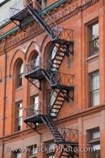 Beautiful details of the Gooderham Building along with the fire escape stairway in view in downtown Toronto.