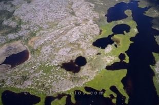 A helicopter tour over the marshlands of Southern Labrador in Newfoundland Labrador, Canada allows visitors to view the creative layout of the land.