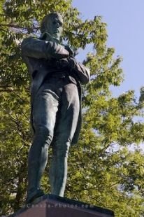 In Square Dorchester in Centre Ville, Montreal in Quebec, Canada, a statue of Robert Burns, a world renown poet and lyricist, is on exhibit.
