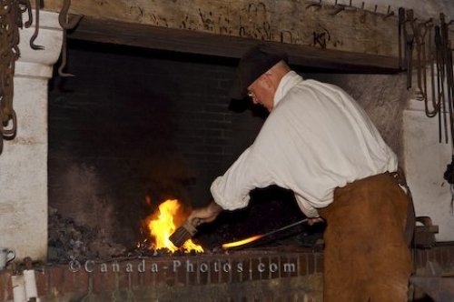 Photo: Blacksmith Demonstration Louisbourg Fortress Nova Scotia