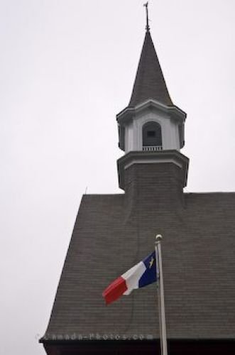 Photo: Memorial Church Bell Tower Acadian Flag Nova Scotia