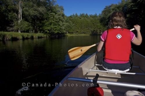 Photo: Mersey River Woman Canoeing Kejimkujik National Park