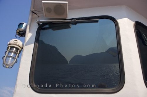 Photo: Reflections Western Brook Pond Newfoundland
