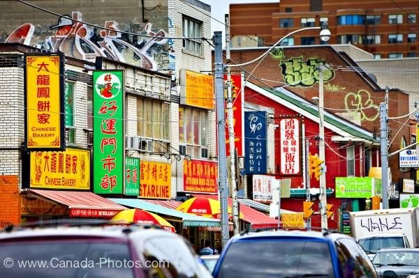 Photo: Street signs in Chinatown in city of Toronto Ontario Canada